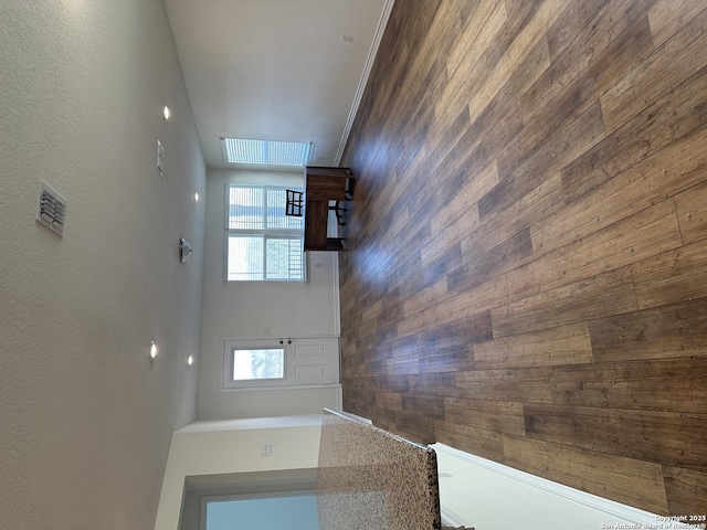 interior space featuring a towering ceiling