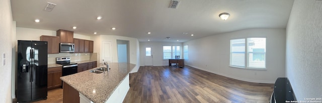 kitchen with plenty of natural light, visible vents, appliances with stainless steel finishes, and a sink