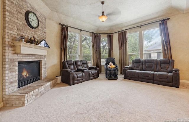 living area featuring carpet, a brick fireplace, and baseboards