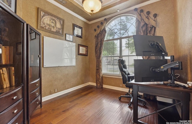 office with ornamental molding, wood finished floors, and baseboards