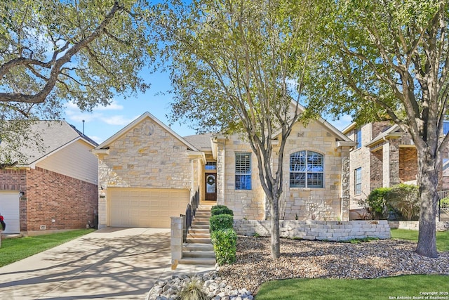 view of front of house featuring a garage and concrete driveway