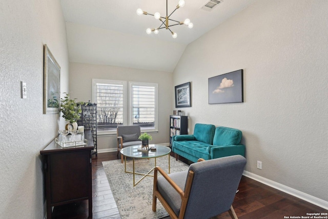 living room featuring lofted ceiling, hardwood / wood-style flooring, baseboards, and visible vents