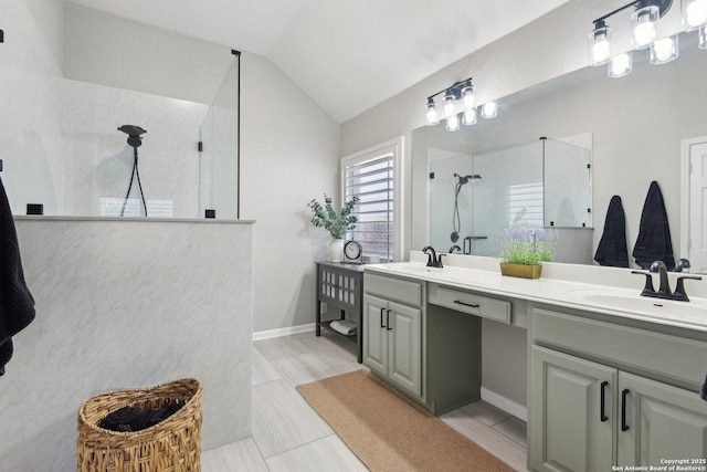 full bath featuring vaulted ceiling, double vanity, a sink, and walk in shower