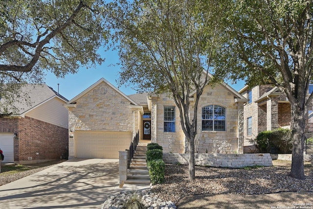 view of front facade featuring concrete driveway