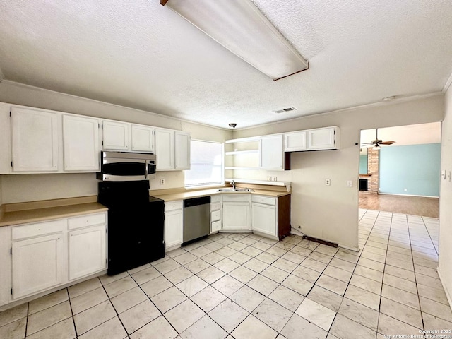 kitchen with ceiling fan, a sink, visible vents, white cabinets, and appliances with stainless steel finishes