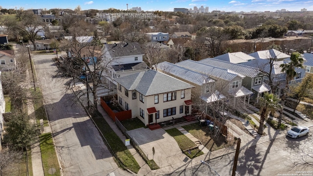 birds eye view of property with a residential view