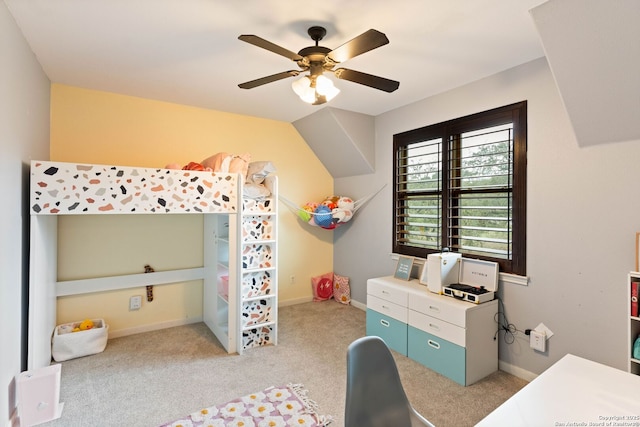 carpeted bedroom featuring a ceiling fan and baseboards