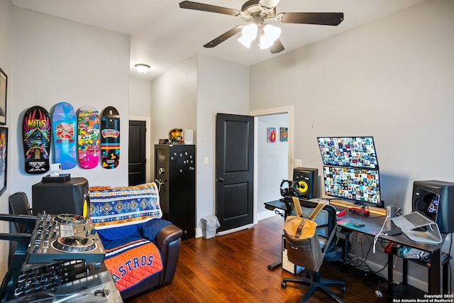 office area featuring a ceiling fan, wood finished floors, and baseboards