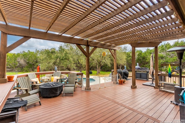 deck with an outdoor fire pit