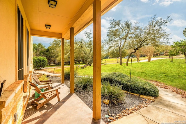 view of patio featuring a porch