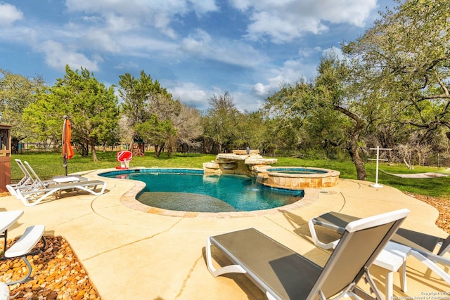view of pool with a playground, a patio area, a lawn, and a pool with connected hot tub
