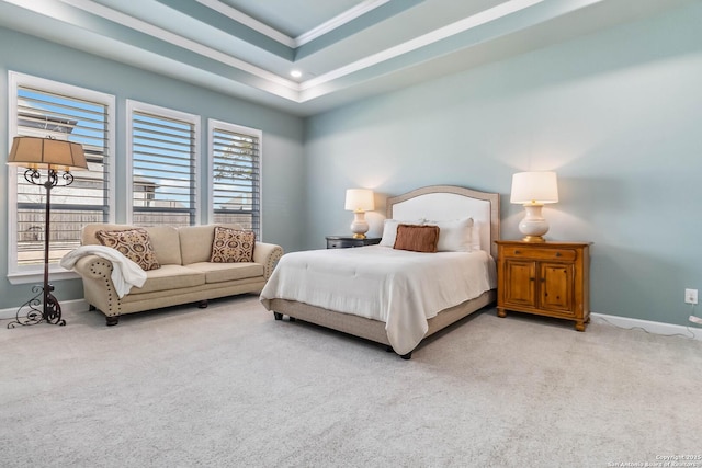 bedroom featuring baseboards and light colored carpet