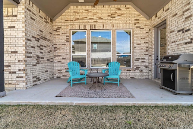 view of patio featuring a grill