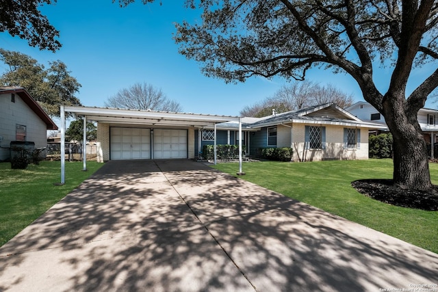 ranch-style house featuring a garage, brick siding, concrete driveway, and a front lawn