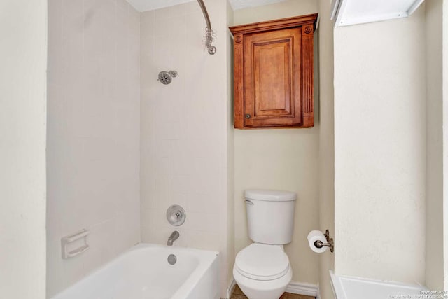 full bath featuring toilet and shower / washtub combination