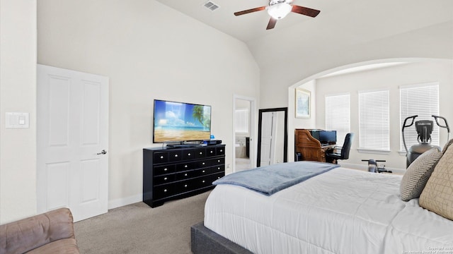 bedroom with visible vents, baseboards, ceiling fan, light carpet, and high vaulted ceiling