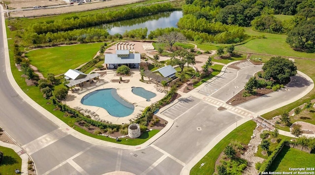 drone / aerial view with a water view