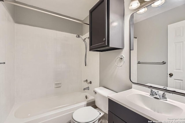 full bath with shower / bathing tub combination, toilet, and vanity