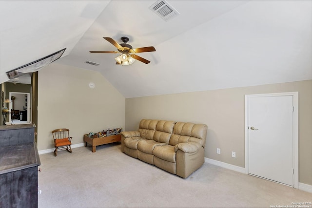 carpeted living room with visible vents, lofted ceiling, baseboards, and a ceiling fan