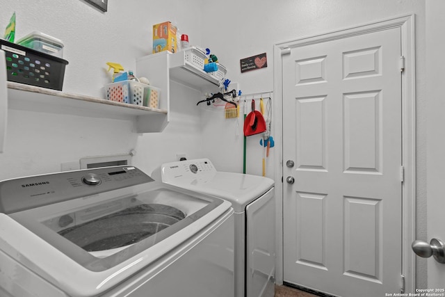 clothes washing area with laundry area and independent washer and dryer