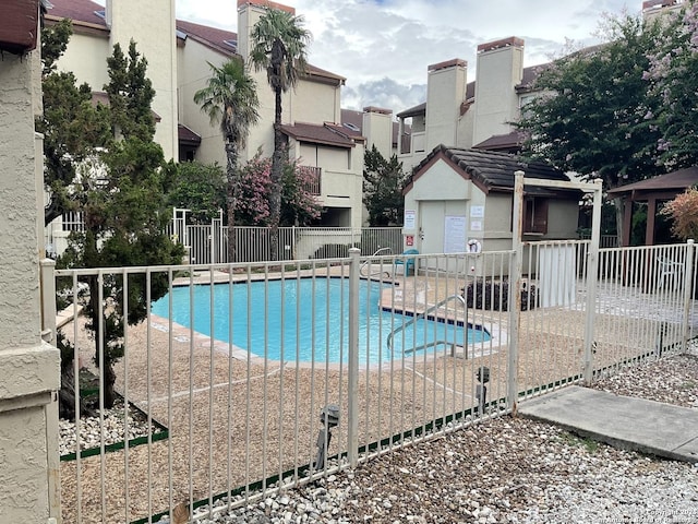 community pool with fence