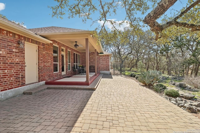 view of patio with a ceiling fan