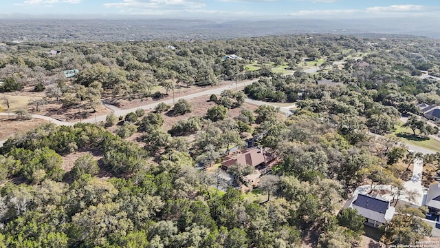 bird's eye view featuring a forest view