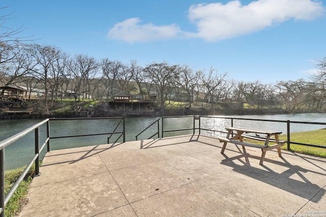 view of patio / terrace with a water view