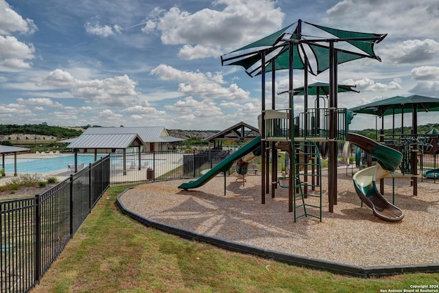 community play area featuring fence