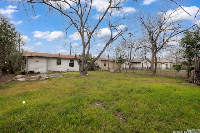 view of yard featuring fence