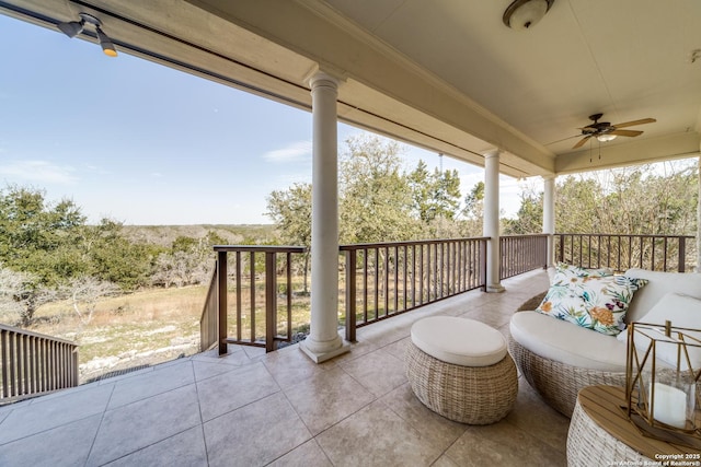 view of patio / terrace featuring ceiling fan