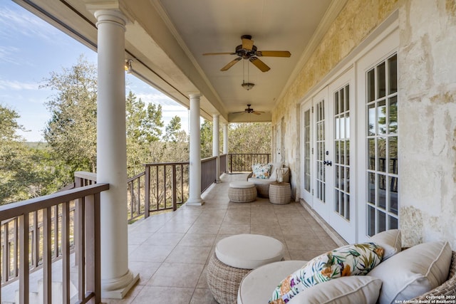 balcony with french doors, an outdoor hangout area, and a ceiling fan