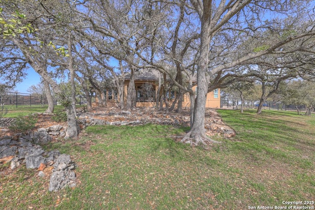 view of yard featuring fence