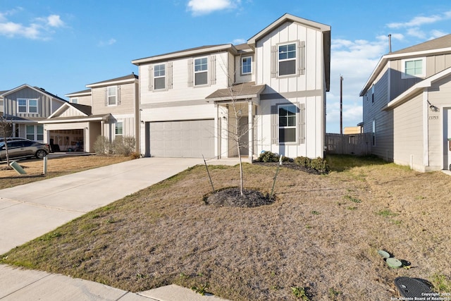 view of front of home with board and batten siding, fence, a residential view, concrete driveway, and a garage