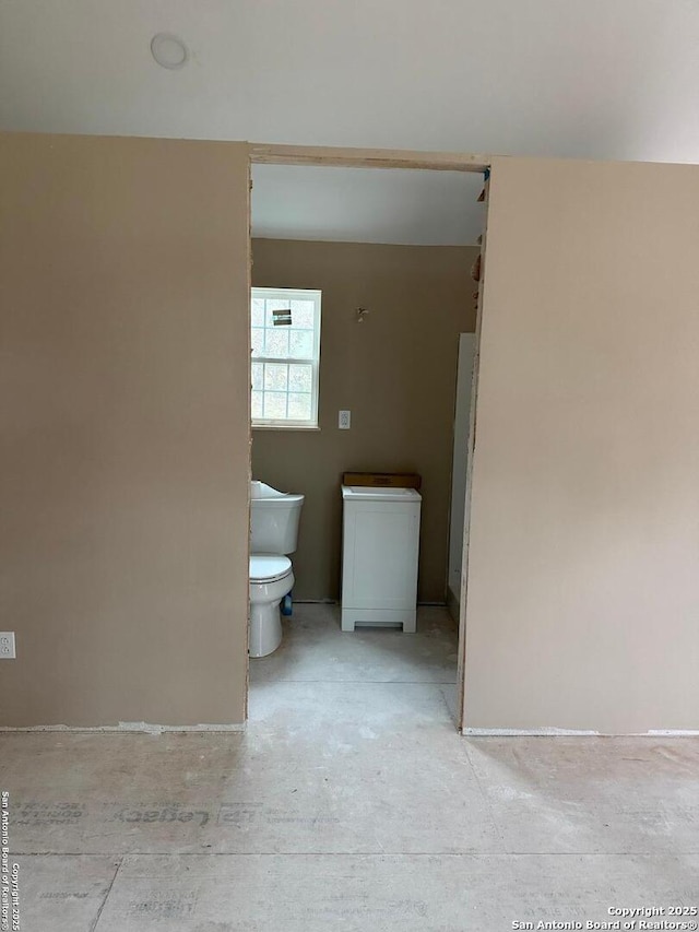 bathroom featuring toilet