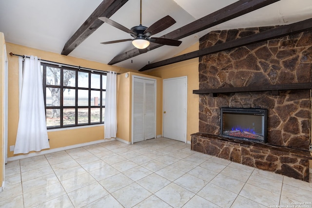 unfurnished living room featuring baseboards, vaulted ceiling with beams, a fireplace, ceiling fan, and tile patterned flooring