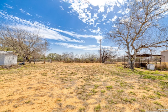 view of yard with an outbuilding