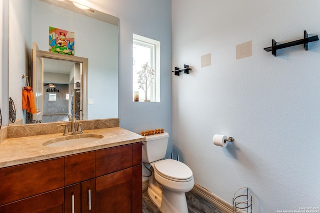 half bath with toilet and vanity