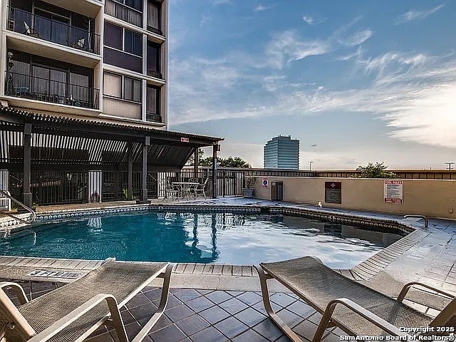 pool with a patio