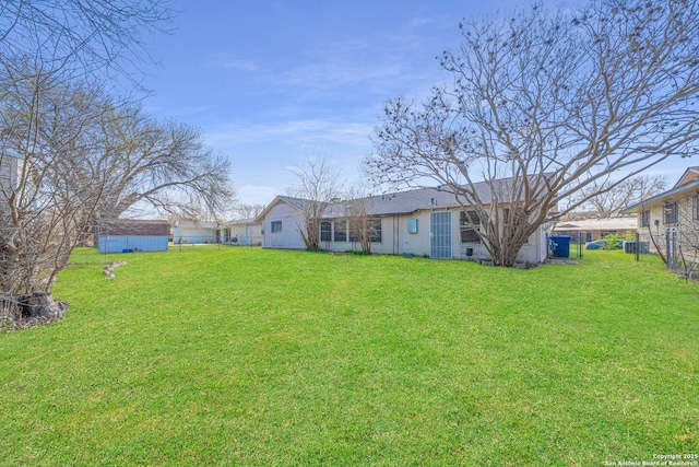 view of yard with fence