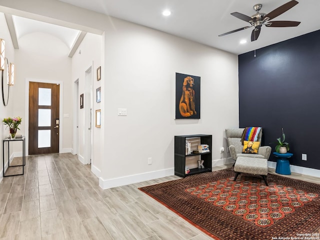 sitting room with recessed lighting, baseboards, light wood-style floors, and a ceiling fan