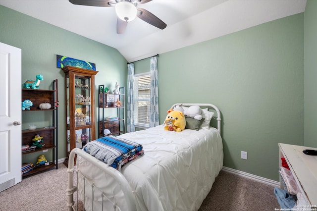 carpeted bedroom featuring ceiling fan, baseboards, and lofted ceiling