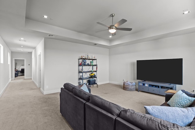 carpeted living area featuring visible vents, recessed lighting, a ceiling fan, and baseboards