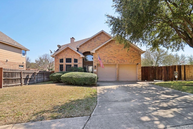 traditional-style home featuring brick siding, an attached garage, concrete driveway, and fence