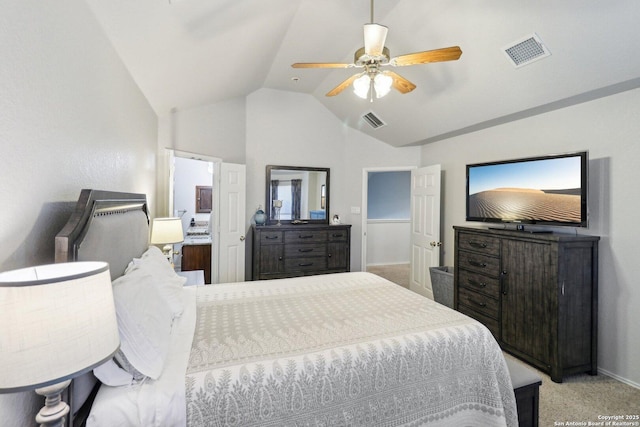 bedroom with visible vents, light colored carpet, and vaulted ceiling