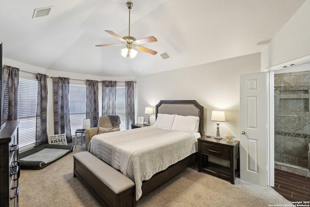 bedroom with visible vents, ceiling fan, and vaulted ceiling