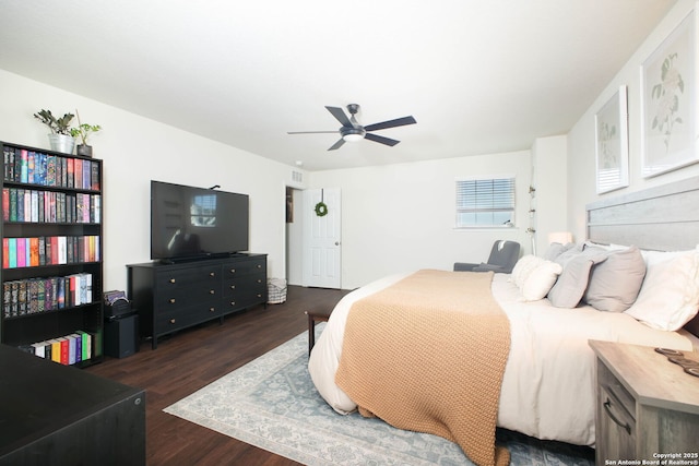 7611 Ponderosa Pne, Boerne, TX 78015 - bedroom with wood finished floors and ceiling fan
