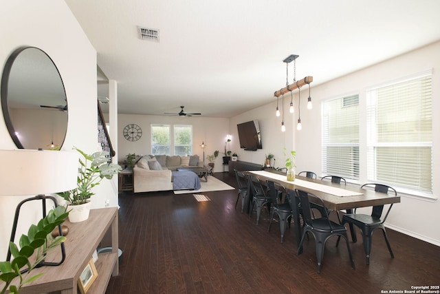 7611 Ponderosa Pne, Boerne, TX 78015 - dining space with wood finished floors, a ceiling fan, and visible vents
