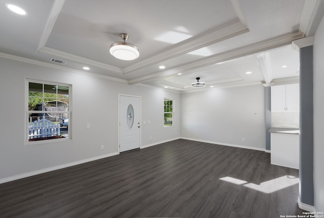 interior space with a raised ceiling, visible vents, and dark wood-type flooring