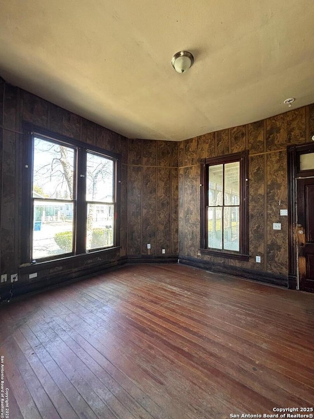 spare room featuring hardwood / wood-style floors